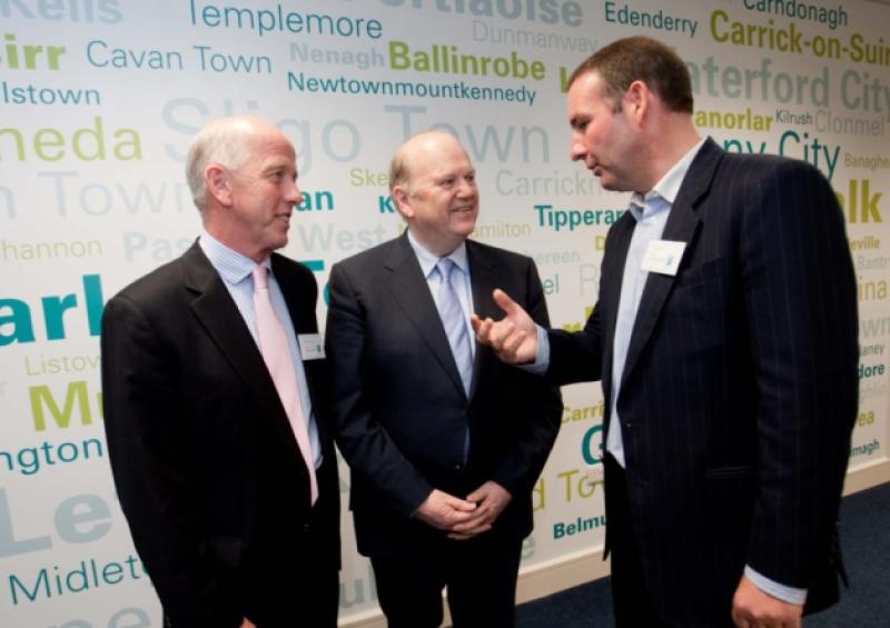 E|net founder Michael Tiernan with Minister Michael Noonan and CEO Conal Henry pictured in May 2011 at the opening of the company's new offices in Plassey