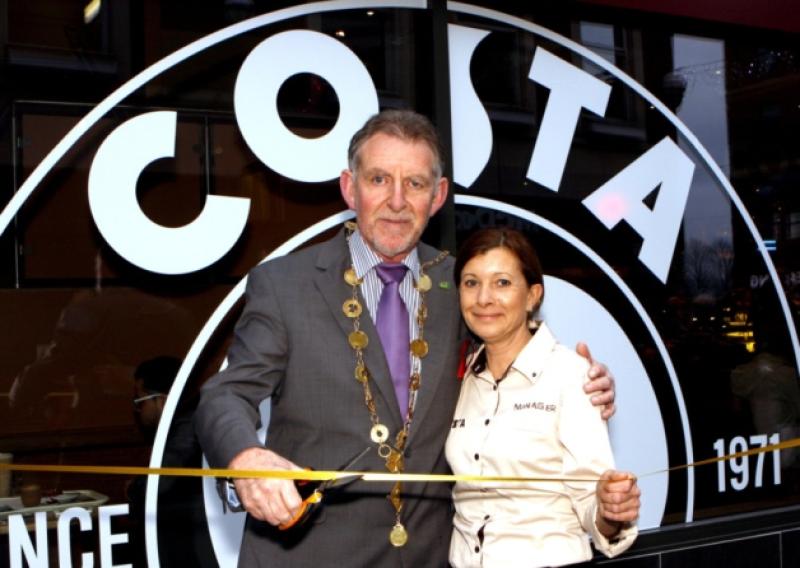 Mayor Michael Sheahan officially opening the new Costa Coffee store in Cruises Street with manager Kim Clarke. Picture: Dave Gaynor