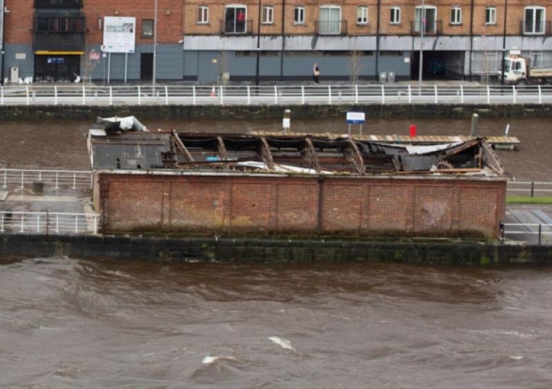 Devastation: The  roof torn off the boat house on Sarsfield Bridge will cost at least �10,000 to repair. Picture: Sean Curtin