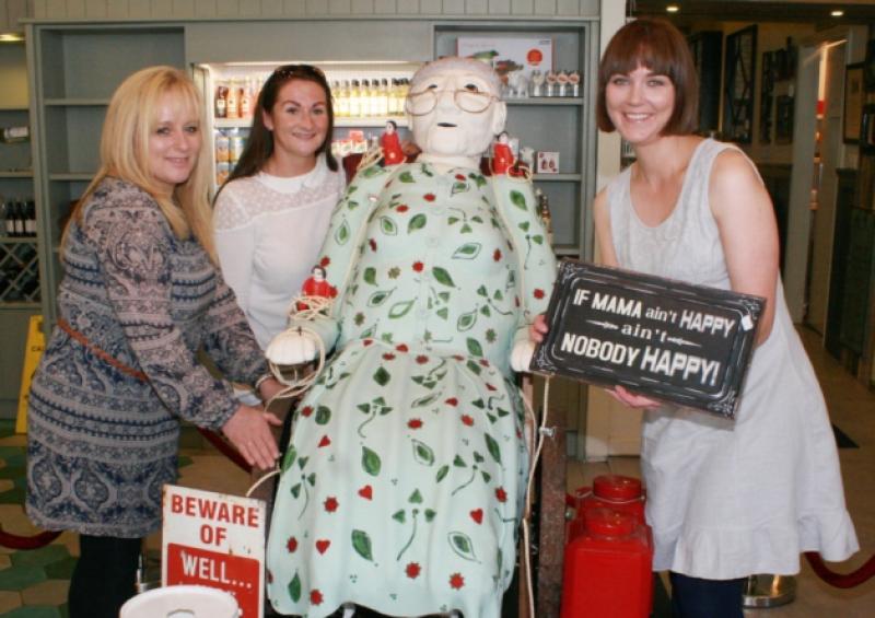 Susan Graham, Susan's Crafty Cakes, Rosemary Dillon, Rosemary Cakes and Yvonne Sheehan, Bondy Rose Bakers with their cake made in the shape of the #LimerickGiant [Picture: Adrian Butler]
