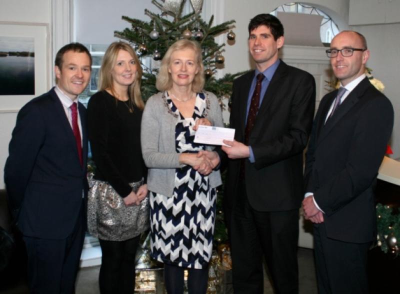 Derek Walsh presents the cheque to Kate Sheahan of St Gabriels, along with Ronan Hynes, Miriam O'Connor and Stephen Keogh