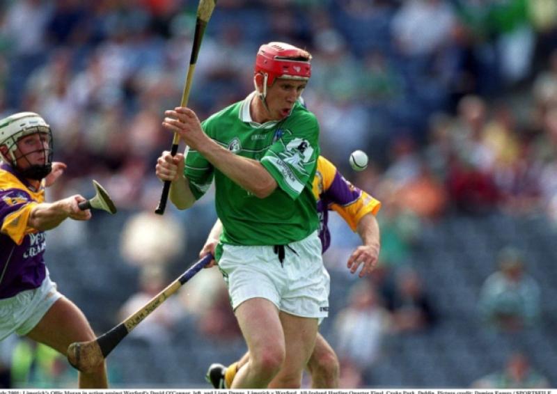 Limerick's Ollie Moran in action against Wexford's David O'Connor, left, and Liam Dunne in the 2001 All Ireland quarter-final
