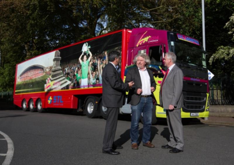 Mike Fitzpatrick, director of City of Culture with Denis Hoctor and Michael O'Riordan of STL Logistics in front of the new articulated lorry in Pery Square this week. Picture: Sean Curtin