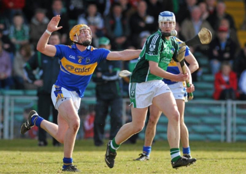 Limerick's Anthony Owens in action against Padraic Maher of Tipperary during the 2010 National Hurling League