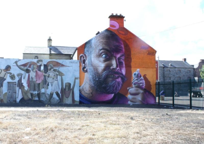 Making a meal of it: An eye-popping design by the famous graffiti artist Smug on Nicholas Street. Picture: Michael Cowhey