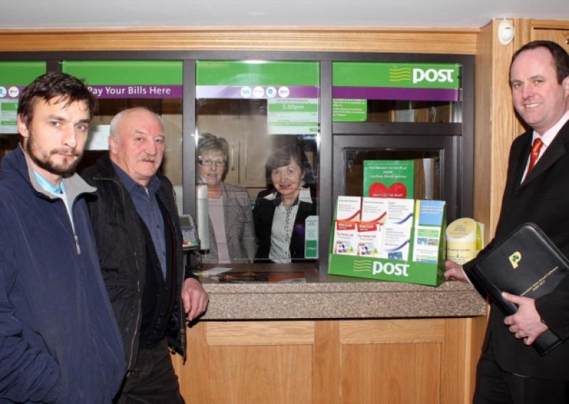 Senator James Heffernan pictured with his parents Kitty and Pat Heffernan, Noreen Wallace, and Tom O'Callaghan at Kilfinane Post Office this week. Picture: Michael Cowhey