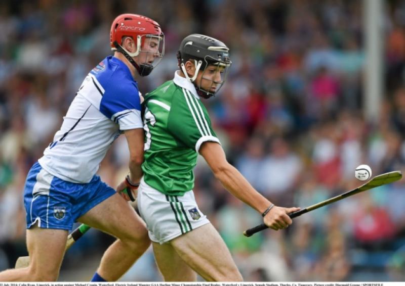 Colin Ryan, Limerick, in action against Michael Cronin, Waterford. Electric Ireland Munster GAA Hurling Minor Championship Final Replay in Thurles on Tuesday night