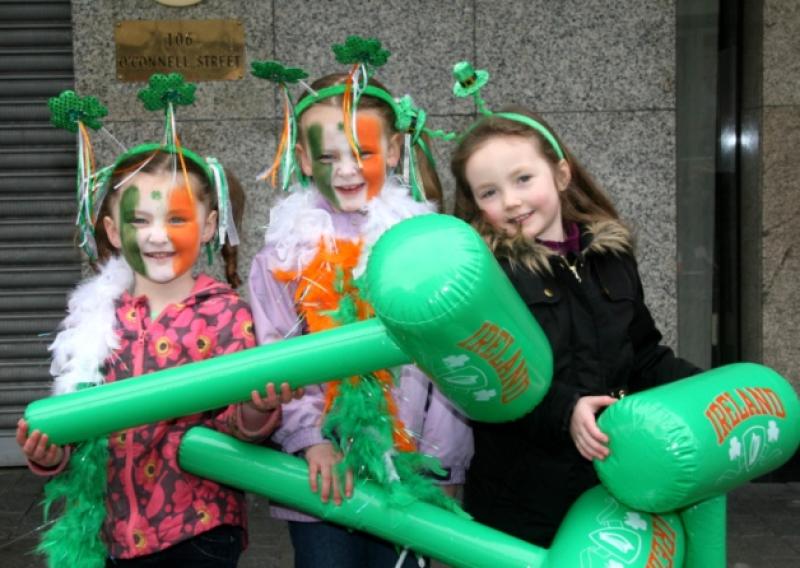 Holiday mode: Emily and Isobelle Kane, Ferndale and Aoife Ryan, Pallasgreen, at last year's St Patrick's Day parade in Limerick. Picture: Adrian Butler