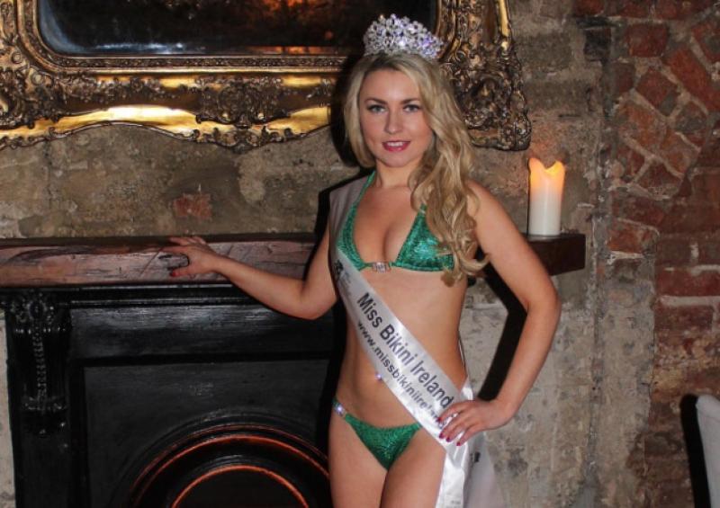 Miss Bikini Ireland Judy Fitzgerald, from Raheen, who recently got an honours degree in nursing at University College Cork, below. She is pictured with UCC president, Dr Michael Murphy