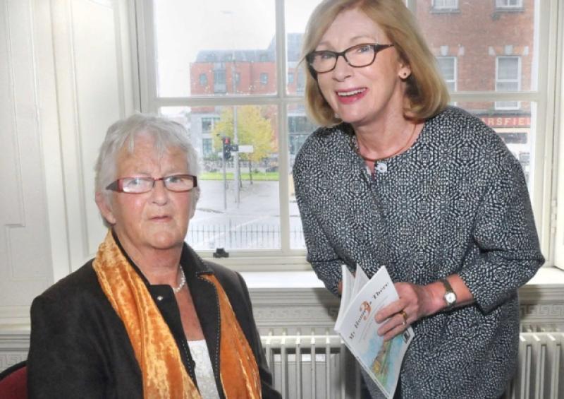 Mae Clancy Leonard pictured with Minister Jan O'Sullivan at the launch of her new book [Picture: Gareth Williams]