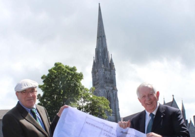 QED: Dan Clery, South Circular Road, and Billy Wallace, Dooradoyle, with an original drawing from M&S Hennessy Architects in 1878 showing the height of the spire at St Johns was 258 feet. Picture: Michael Cowhey