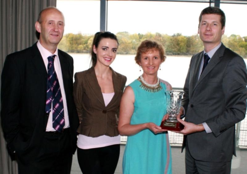 Ivan Tuohy of the Clarion Hotel presenting the Limerick Person of the Month award to Margaret OConnor. Also present are Ray Ryan, of Southern and Aine Fitzgerald of the  Limerick Leader [Picture: Adrian Butler]
