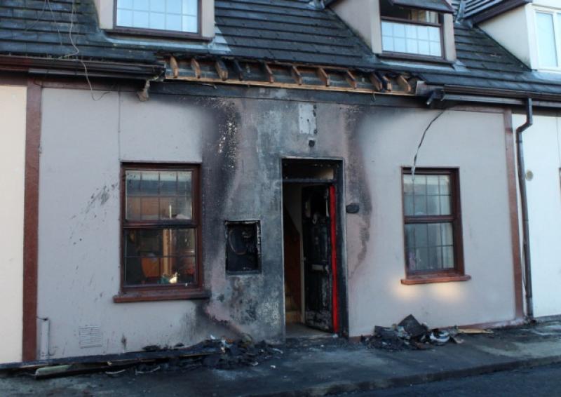 The house in Cathedral Court that was damaged by fire. Picture: Mike Cowhey