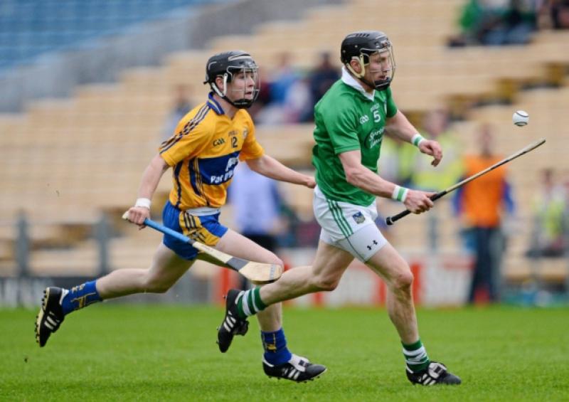 Wayne McNamara, Limerick, in action against Tony Kelly, Clare