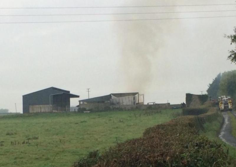 The scene from the roadside at the latest hay barn fire at Ballyvalode, Oola       Picture: Michael Cowhey