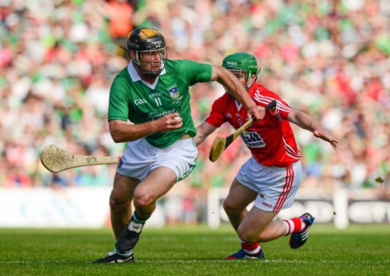 James Ryan, who scored three points from play, races away from Daniel Kearney, Cork, in the Munster senior hurling final at the Gaelic Grounds