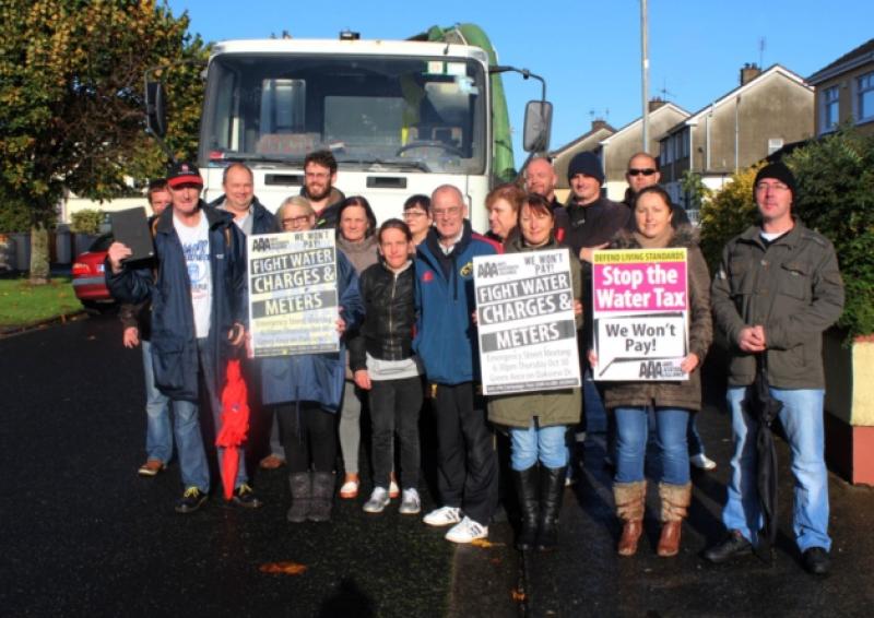 A group protesting in Ballinacurra Gardens over water charges and the installation of meters