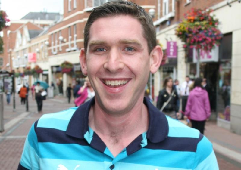 International referee George Clancy spoke to the Queen. Below, Eoin Reddan at the reception