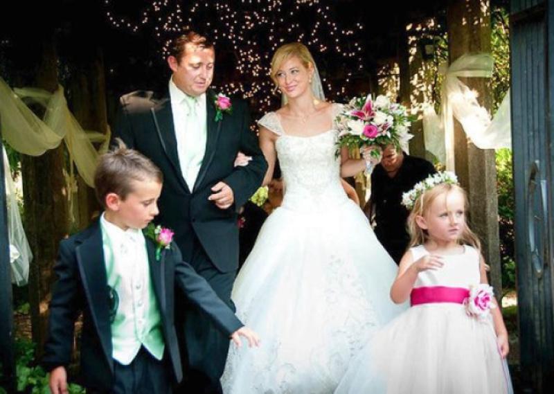The wedding day of Molly Martens and Jason Corbett in 2011 in Tennessee, with children Jack and Sarah. Molly later enquired about divorce proceedings