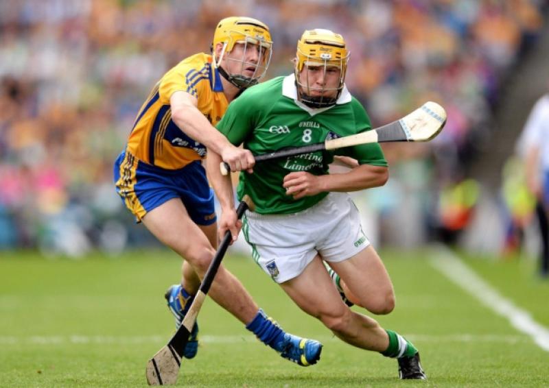 Paul Browne in action against Clare at Croke Park. His yellow Cooper helmet, which  was stolen following the match has since been recovered by gardai. [Picture: Sportsfile]