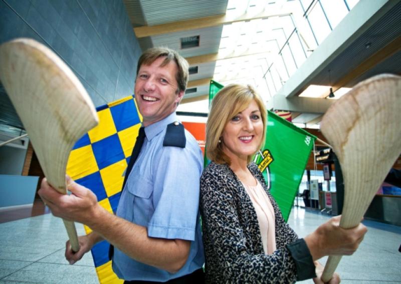 Bragging rights: Alan Neville, All-Ireland winner with Clare in 1995 and a member of Shannon Airport Police and Fire service, pictured with Sandra Marsh, Aer Lingus duty manager.  Picture: Arthur Ellis