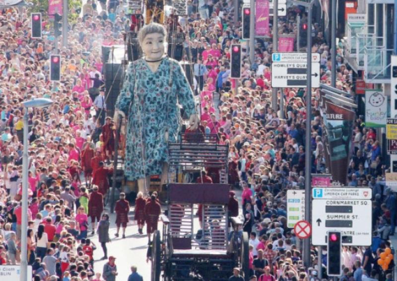 Granny makes her way down a packed Sarsfield Street [Picture: Mike Cowhey]