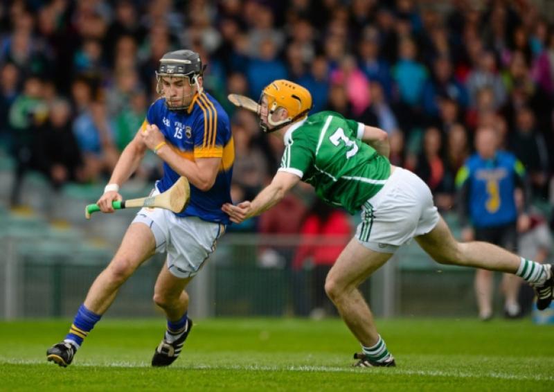 John McGrath, Tipperary, in action against Richie English, Limerick