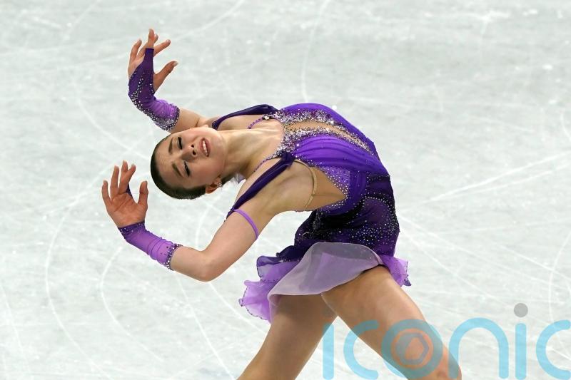 Kamila Valieva leads standings as 15-year-old competes amid cloud of controversy