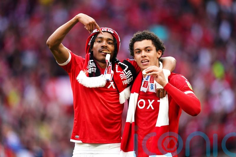 Nottingham Forest players celebrate the club’s return to the Premier League