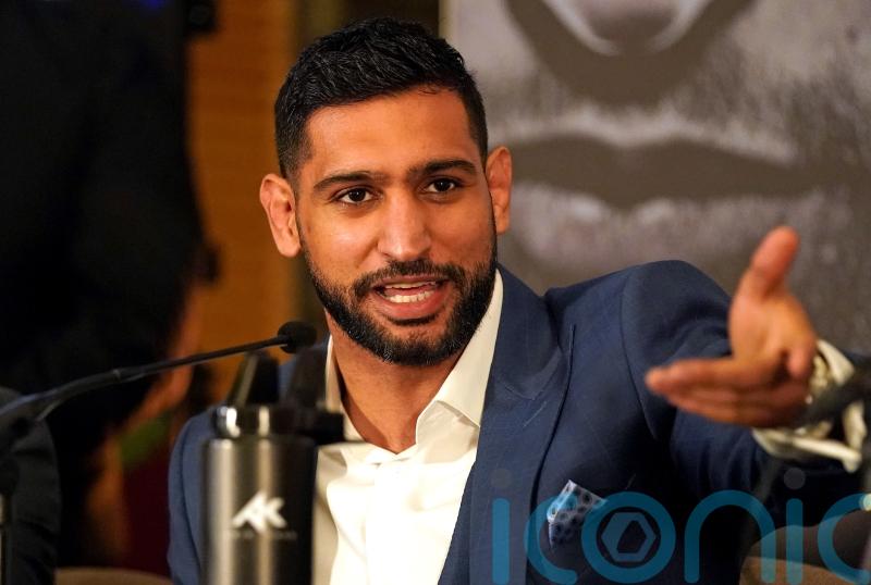 Three men charged after boxer Amir Khan ‘robbed at gunpoint’