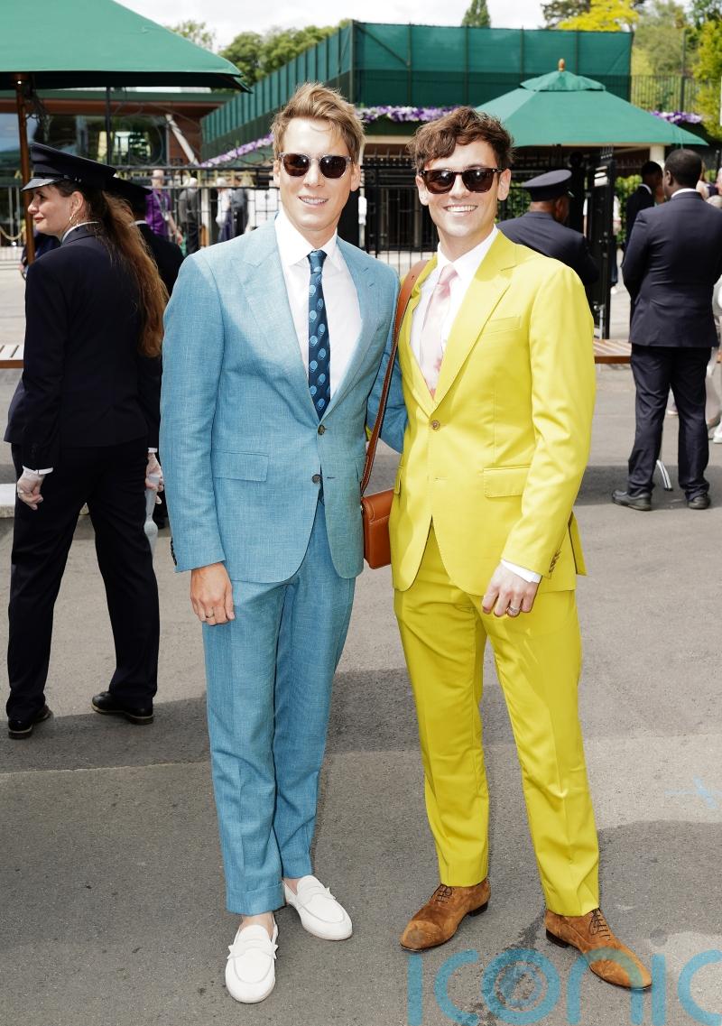 Tom Daley and Dustin Lance Black watch Wimbledon action from royal box
