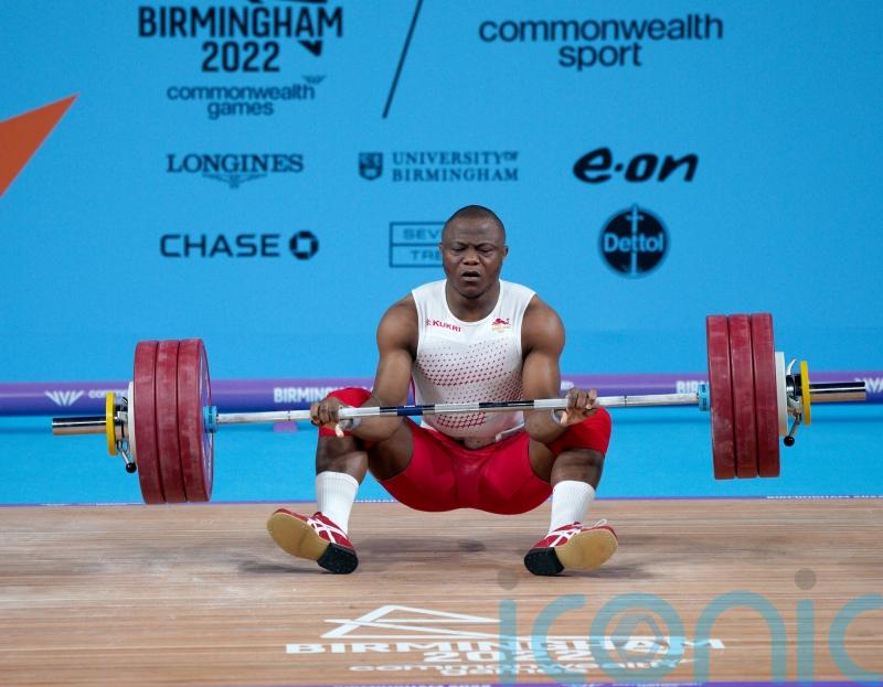 Weightlifter Cyrille Tchatchet’s medal hopes ended by body cramps