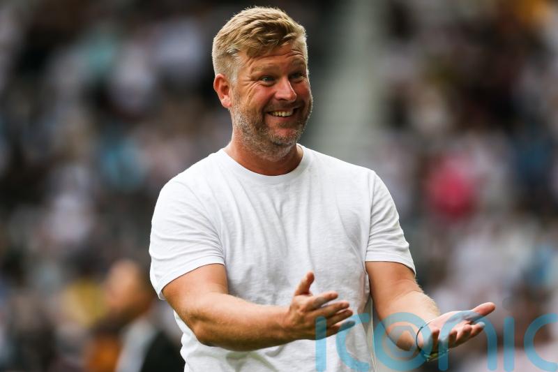 Oxford boss Karl Robinson could ring the changes for Swansea clash