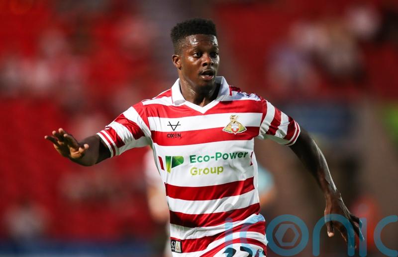Kieran Agard’s stoppage-time strike earns Doncaster victory over Stockport