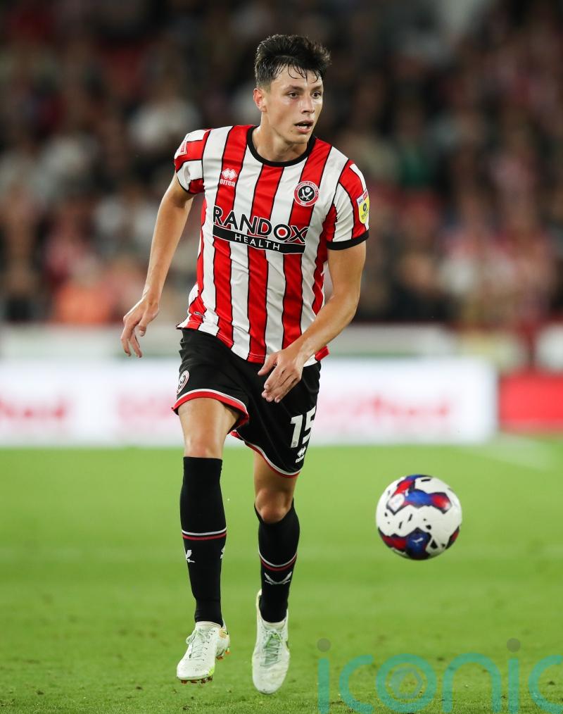 Sheffield United storm to top of table after Reading rout