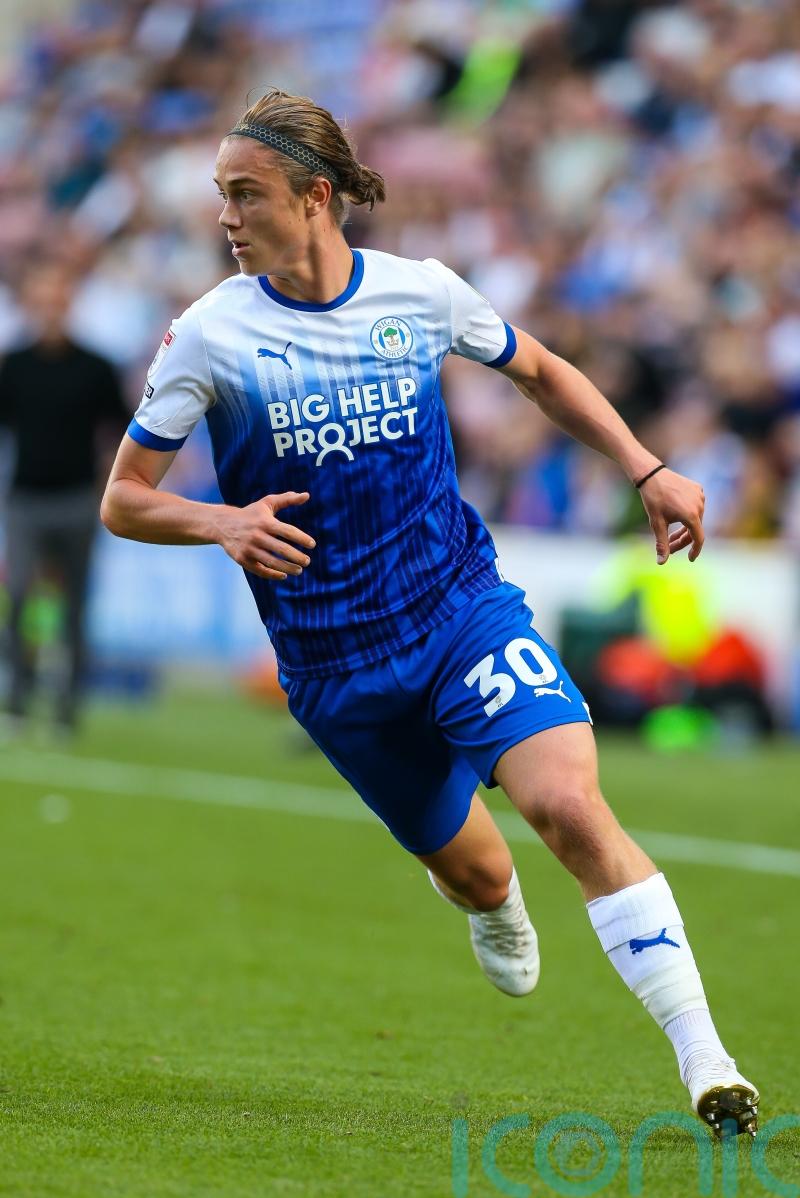 Thelo Aasgaard’s late strike gives Wigan victory at Luton