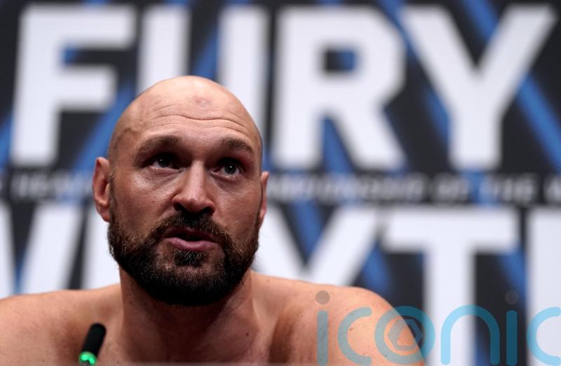 Tyson Fury makes ring return… as heavyweight champ floors WWE star in Cardiff