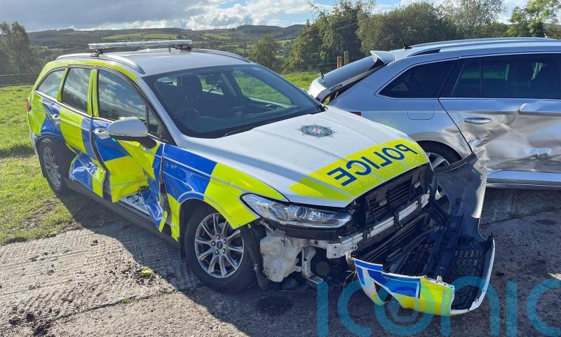 Man remanded on attempted murder charges after police cars rammed by tractor