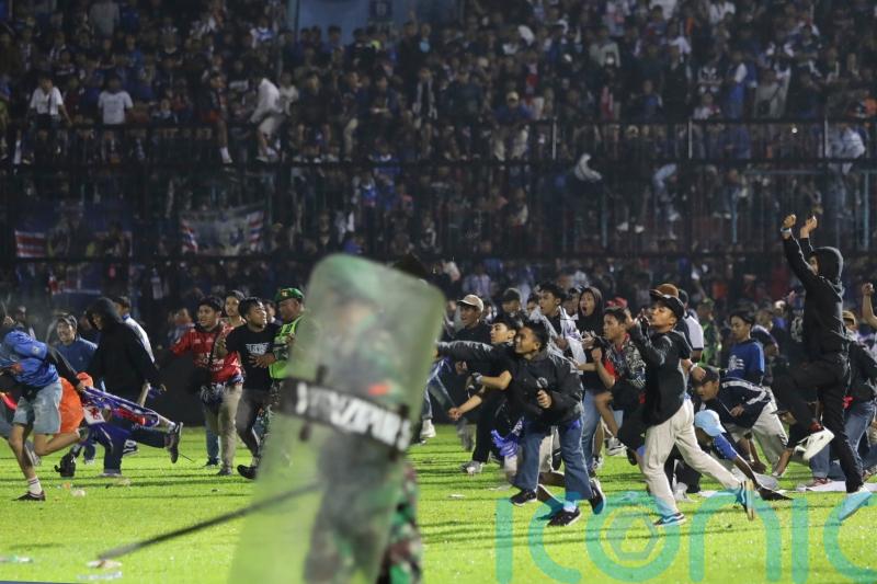 At least 174 people reportedly dead after stampede at football match