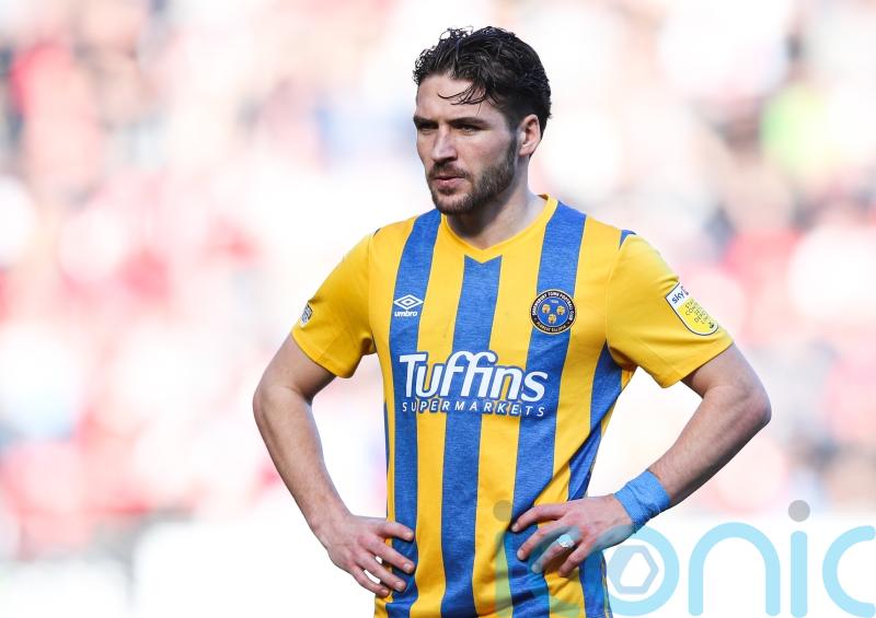 Luke Leahy stays cool from the spot to help Shrewsbury to victory
