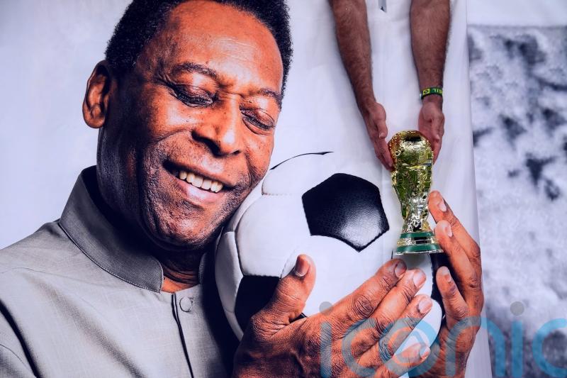 Football world pays tribute to Pele after three-time World Cup winner’s death