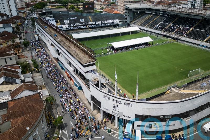 Pele to be buried today after lying in state at Urbano Caldeira stadium