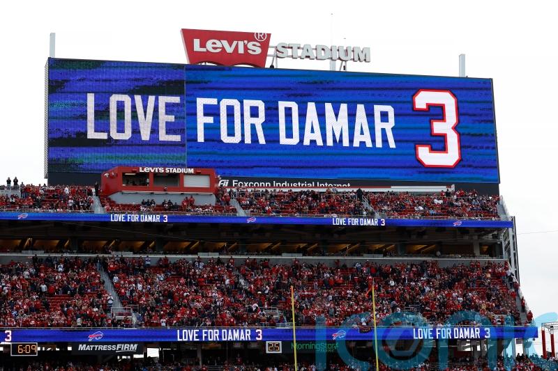Damar Hamlin remains in hospital but ‘is in good spirits’ after cardiac arrest