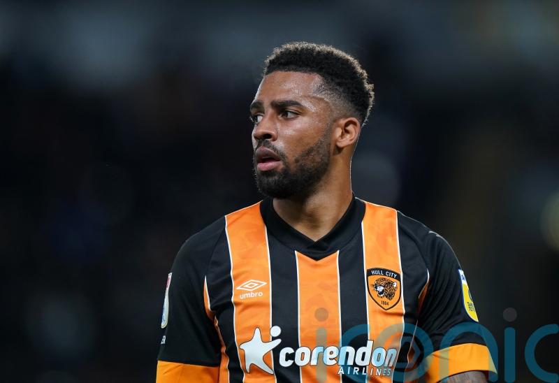 Cardiff’s relegation concerns suffer blow as Cyrus Christie nets Hull winner
