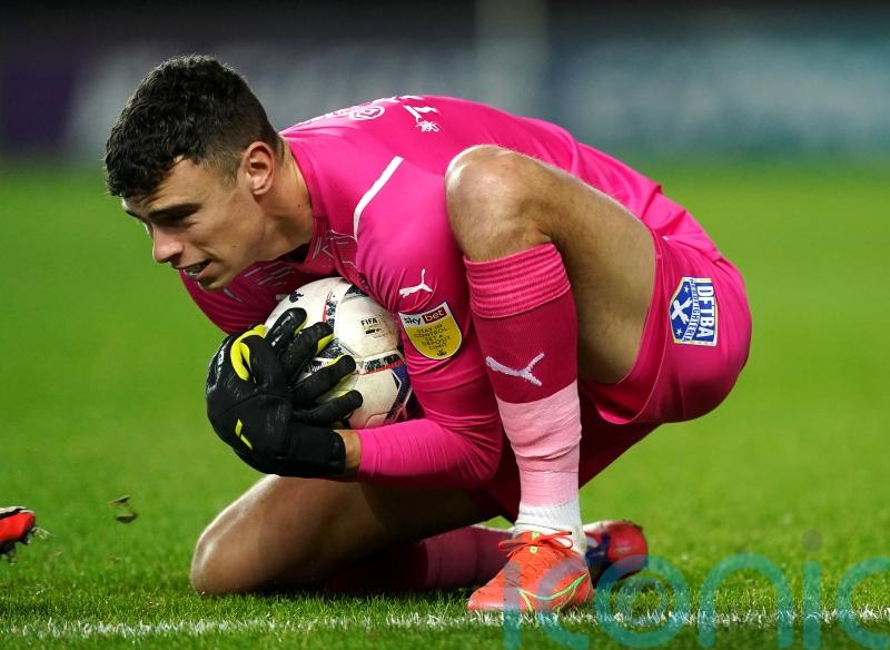 AFC Wimbledon and Carlisle share spoils as goalkeepers come out on top