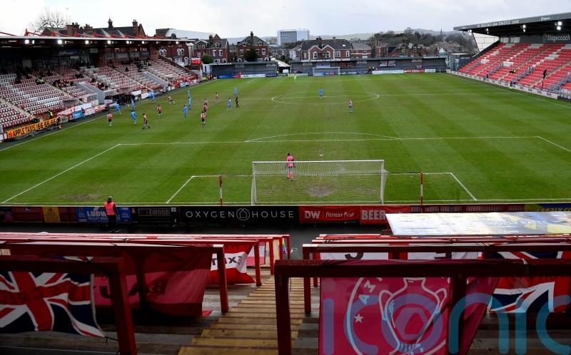 Exeter’s Sam Nombe hailed after double sinks Lincoln