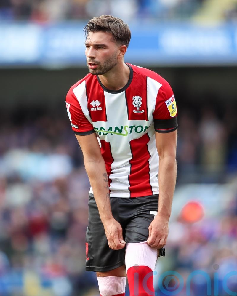 Daniel Mandroiu levels for Lincoln as Sheffield Wednesday dip continues