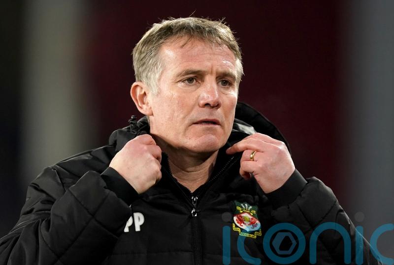 Phil Parkinson says Wrexham ‘stunned’ by loss to Halifax in blow to title hopes