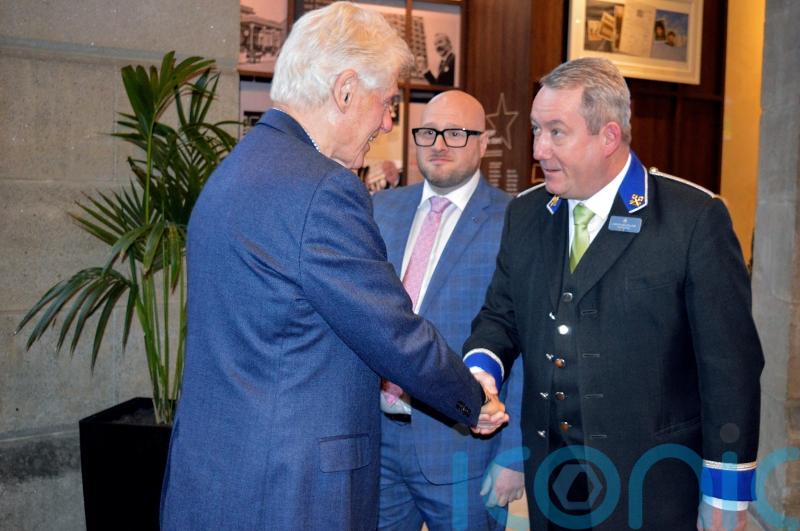 Bill Clinton reunited with hotel concierge he first met in the 1990s