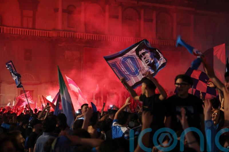 Napoli’s fans light up the sky as they celebrate Serie A title win